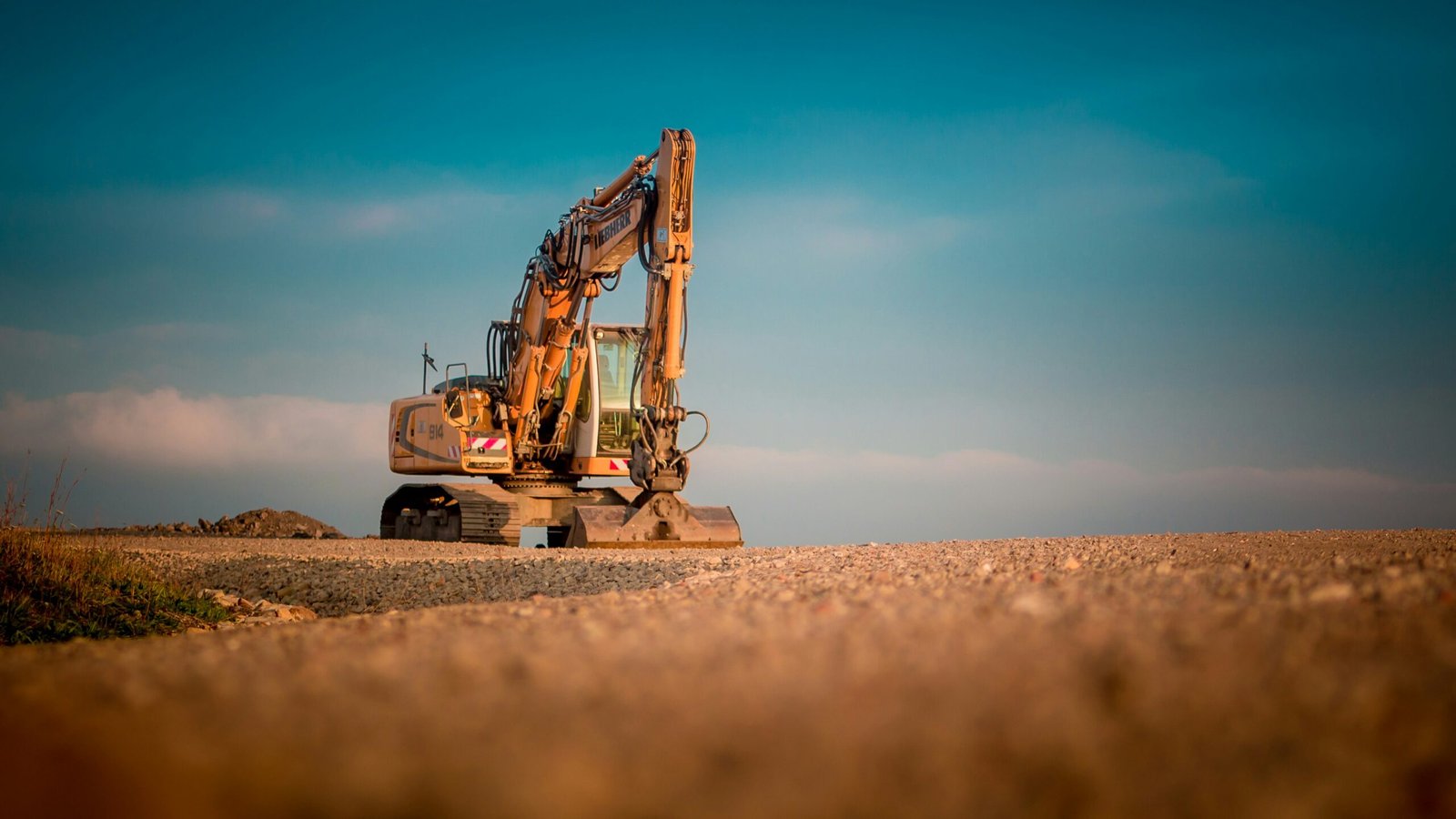 Excavator in a field